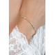 ZINZI gold plated zilveren tennisarmband 2,1mm breed bezet met witte zirkoniaƒ?Ts in verfijnde rijzetting, afgewisseld met drie grotere witte zirkonia's (4,3mm) in chatonzetting ZIA2894Y - 59438
